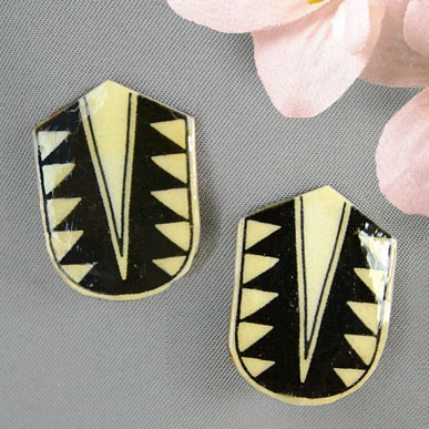 black and cream arrow shaped clip-on earrings