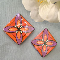 lacquered clip earrings in quilt squares pattern