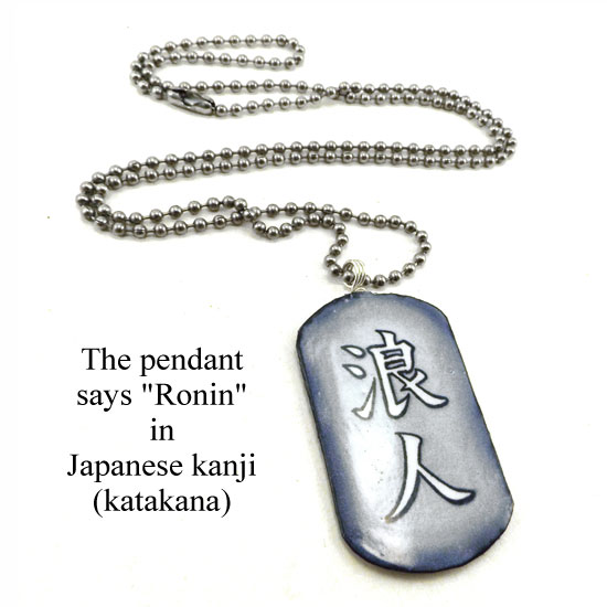 lacquered paper dogtag necklace that says Ronin in Japanese katakana