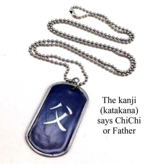 this custom designed paper and stainless steel dogtag necklace says Chichi or Father in Japanese katakana