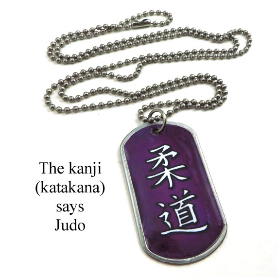 stainless steel and lacquered paper dogtag necklace that says Judo in Japanese katakana