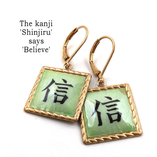 kanji earrings that say Shinjiru, which means Believe.... these are made with brass and lacquered paper