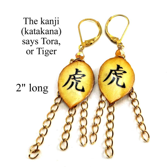 gold lacquered paper earrings with gold plated brass chain and the Japanese katakana that says Tora, or Tiger