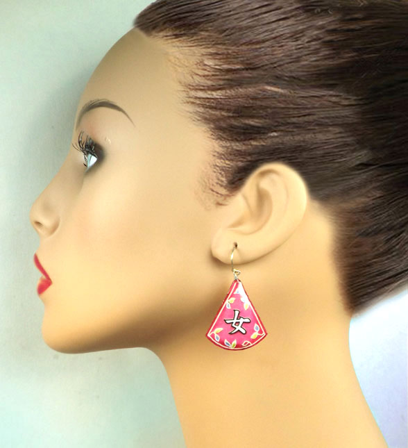 lacquered paper earrings that say Onna, or Woman, in Japanese katakana...available at paperjewels.com