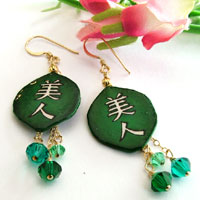 deep green earrings with swarovski crystals and the kanji bijin, which means beautiful woman or hot babe