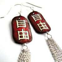 dark red paper earrings with sterling silver tassels and the Japanese kanji that says Freedom