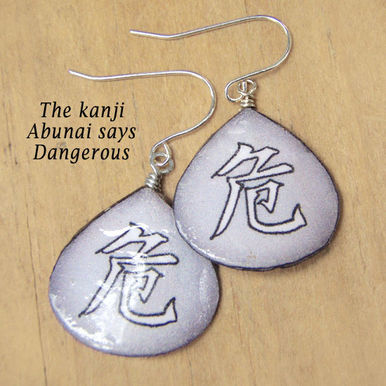 lacquered paper earrings with the Japanese kanji Abunai that says Dangerous