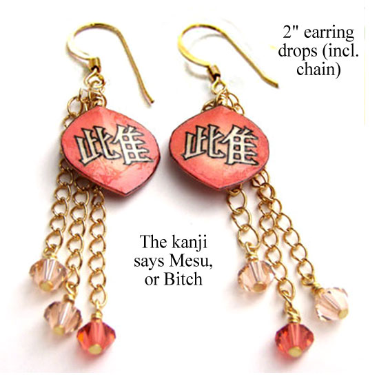 japanese kanji lacquered paper earrings say Mesu, or Bitch. Shown in coral with coordinating Swarovski crystals dangling from gold plated chain