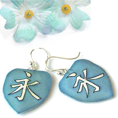 lacquered paper earrings with the japanese kanji onna, or woman... in bronze with floral pattern and sterling silver earwires