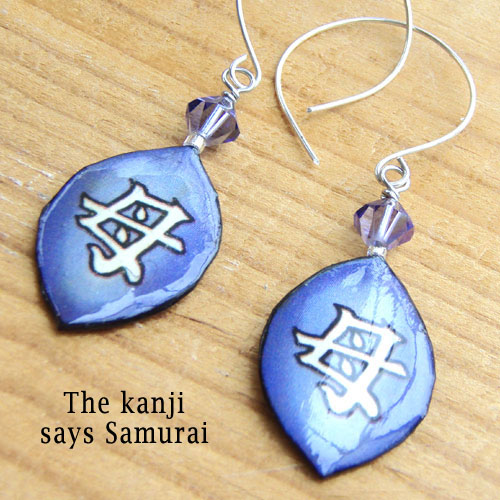 lacquered paper earrings in soft blue lilac, 
the japanese kanji for Samurai, and Swarovski crystals, and sterling silver earwires