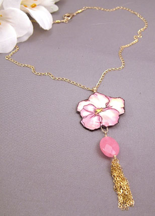 necklace with pink pansy pendant is decorated with 
faceted oval pink jade and a gold-filled chain tassel