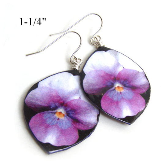 paper earrings are purple pansy flowers on black