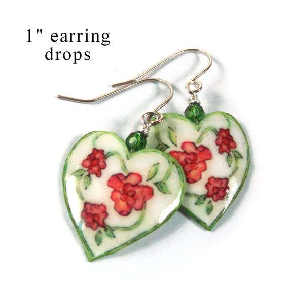 paper earrings are white hearts with flowers from paperjewels.com