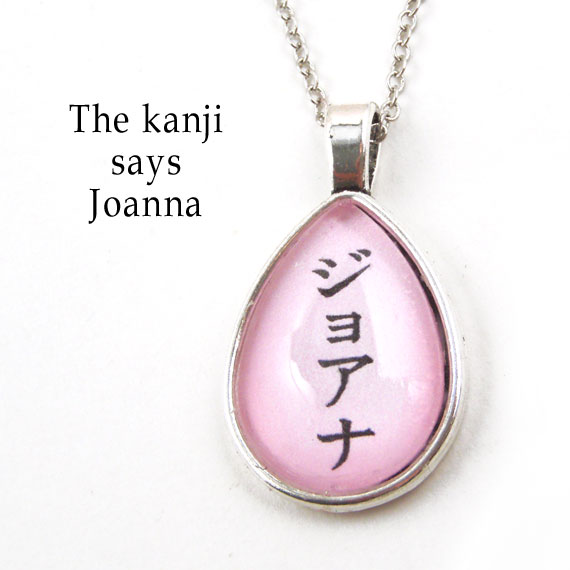 personalized kanji necklace that says Joanna in Japanese kanji...the teardrop pendant is shown in soft green...custom colors are available