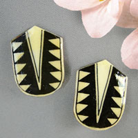 lacquered paper clip on earrings in a geometric arrow design with black and cream