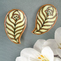 cream with tan feather shaped clip on earrings