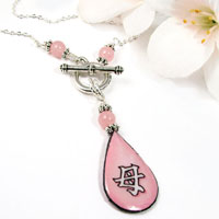 kanji necklace with pink teardrop pendant that says Mother