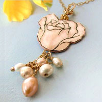 gold necklace with pale cream-peach rose and handwired pearls